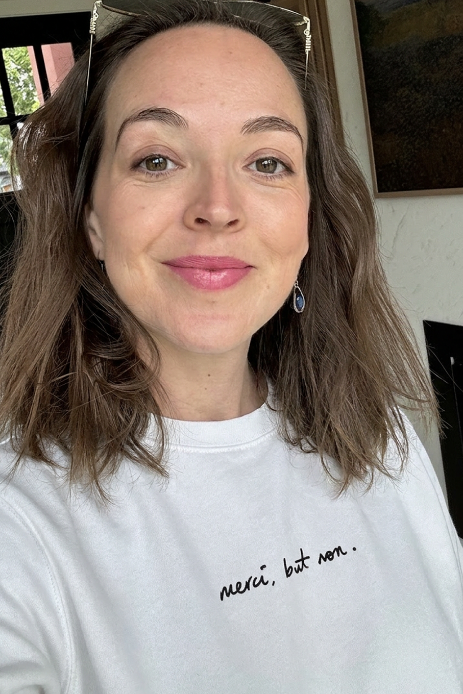 "merci, but non." signature unisex organic mid-weight sweatshirt